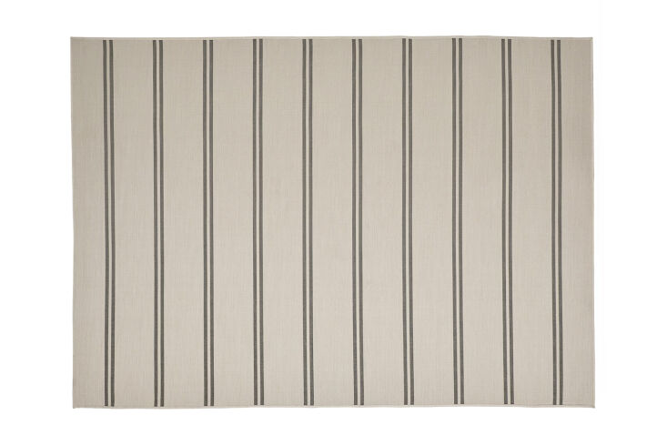 The affordable Ikea Virklund Flatwoven Rug in beige and dark gray is \$69.99.