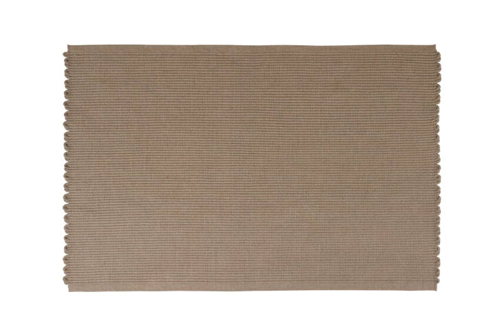 The Danish AYTM Redono Rug in taupe is \$479 at Nordic Nest.