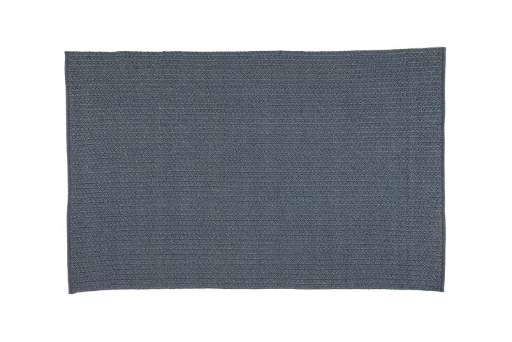 The West Elm Iver Indoor-Outdoor Rug is woven in a weather-resistant blend; starting at \$685.