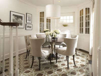  Cape Cod Traditional Dining Room &#8\2\1\1; The floor of this Cape Cod style dining room, with built in corner cabinets, features a custom painted design in place of a rug for a traditional yet modern feel.