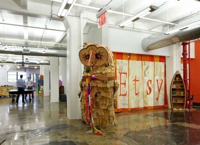  Etsy Offices: Located in Dumbo, Brooklyn, designed for the world&#8\2\17;s most vibrant handmade online marketplace, we transformed a raw space into an Etsy world. A series of open workspace areas and acoustically controlled environments were generated providing access to natural light. Core common spaces are contained within two continuous curved walls permitting passage and reinforcing transparency. Handmade materials are introduced promoting the brand and contrasting the loft space. Photo: Ty Cole.