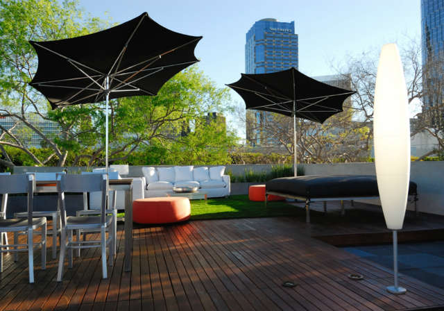  Century City Rooftop: Inspiring cityscapeContemporary outdoor furnishings and sun shades create entertainment areas with dramatic rooftop views of the city. Photo: Russ Cletta