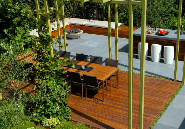  Studio City: Outdoor dining roomEcologically sound ipe decking and honed bluestone pavers sit flush on the ground plane beneath the dining trellis. Photo: Russ Cletta