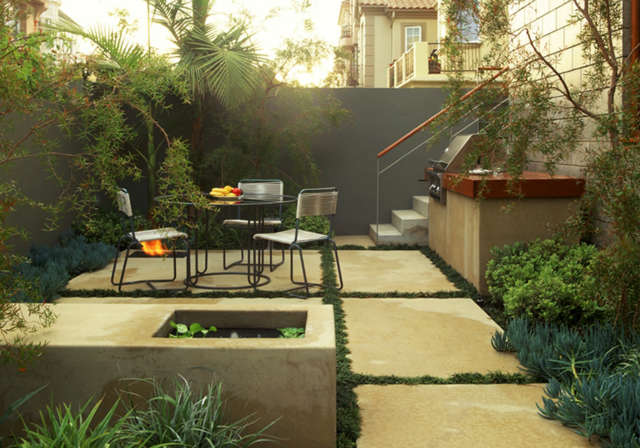  Marina Del Rey: Small-space garden Concrete pavers, a fountain with a miniature water garden, and a built-in barbecue anchor the space. The grill&#8\2\17;s countertop ties in architectural detail. Photo: Lisa Romerein