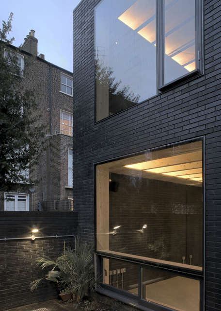  The Shadow House: The project’s name (a reference to Junichiro Tanizaki’s paean to mindfulness, ‘In Praise of Shadows’) comes from its skin, which is expressed in a black slim-format glazed brick. Photo: Keith Collie