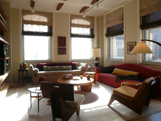  Tribeca Loft Living Room &#8\2\1\1; We mixed new pieces with old, the square back chair is designed by Frank Lloyd Wright, The table is Harvey Probber. The arc lamp is Italian Mid Century. The shades were custom made using burlap linen over horse hair.