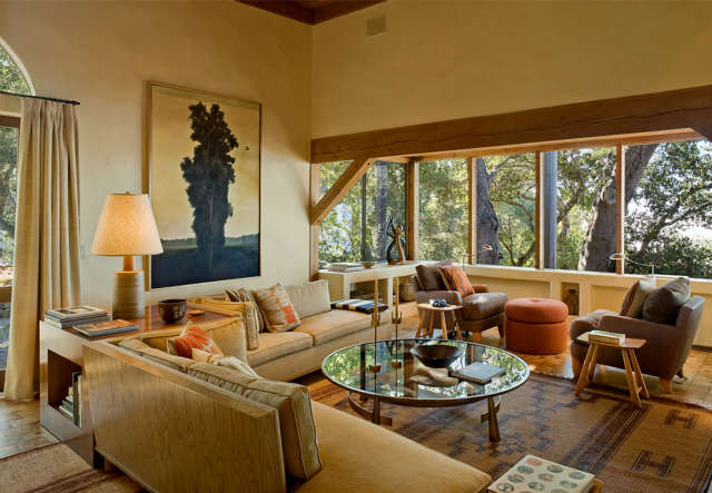  Big Sur Cabin &#8\2\1\1; Living Room &#8\2\1\1; Honoring the prominent history of this home, we made very few careful interventions to update the lighting, the kitchen and the bathroom. An earth tone palette and mostly simple linens were chosen for a comfortable, informal interior. A complimentary mix of the clients stunning art, mid-century accent pieces and local ceramics make for a playful and relaxing weekend home.View on our website