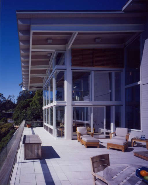  San Francisco House: SF House&#8\2\1\1; Located on the cliffs of the San Francisco shoreline, the architects radically transformed the structure to accommodate a seismic upgrade. The dramatic redesign of this modern house took full advantage of the home’s breathtaking views.The original house worked against the spectacular site. “With its massive over-scaled roof and heavy timber detailing, reminiscent of Polynesian architecture, the house dominated the site, without taking advantage of the incredible view.