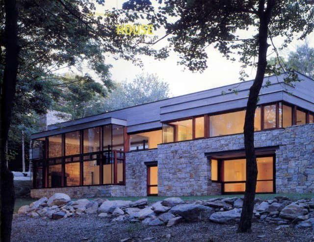  Stone* House: Located in Pound Ridge, NY, this stone & wood house was commissioned as a spec. house to be built within a very tight budget. The house was sited deep into an embankment overlooking a beautiful 4 acres pond. By opening up the house through large expanse of glass, we used the Japanese concept of “borrowed views” to bring the picturesque landscape into the house.