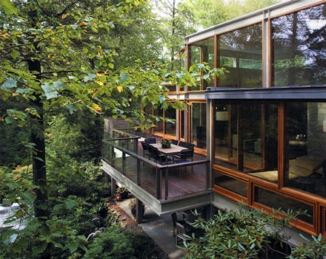  Modern Tree House: Ogawa / Depardon was commissioned to renovate & restructure an existing modernist house in Bedford, New York.The design consisted of tearing off the back wall of the house & restructuring it with a steel frame. This allowed very large custom wood & glass windows to be introduced giving full-unencumbered access & views to the beautiful site.The house was gutted & modernized throughout.