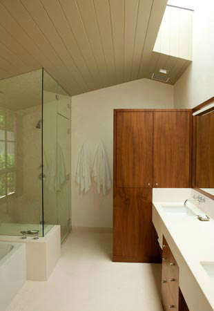  La Mesa Residence &#8\2\1\1; Bathroom with double sinks and natural lighting emitting through skylight over sink.