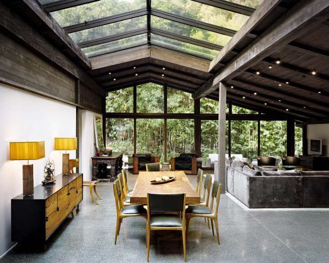  Experimental Ranch: Designed by architect Cliff May as his personal residence, the Experimental Ranch House is located in the Sullivan Canyon area of Los Angeles. Completed in \195\2, the house is a unique example of the evolution of Ranch House design. The goal of the residential was to reinstate the original open plan layout while preserving the integrity of May’s exposed wood beam and rafter structure. The great room acts as the focal point of the house, containing the main living space and kitchen. Photo: Joe Fletcher and Marmol Radziner