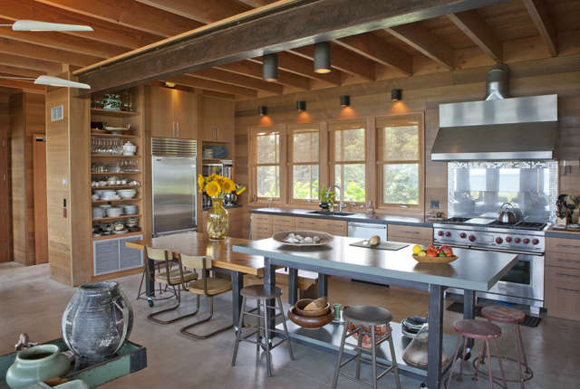  East Chop Residence: This open kitchen allows plenty of work space for a family that enjoys entertaining, and includes moveable hydraulic work surfaces that convert to dining tables. Photo: Peter Vanderwarker
