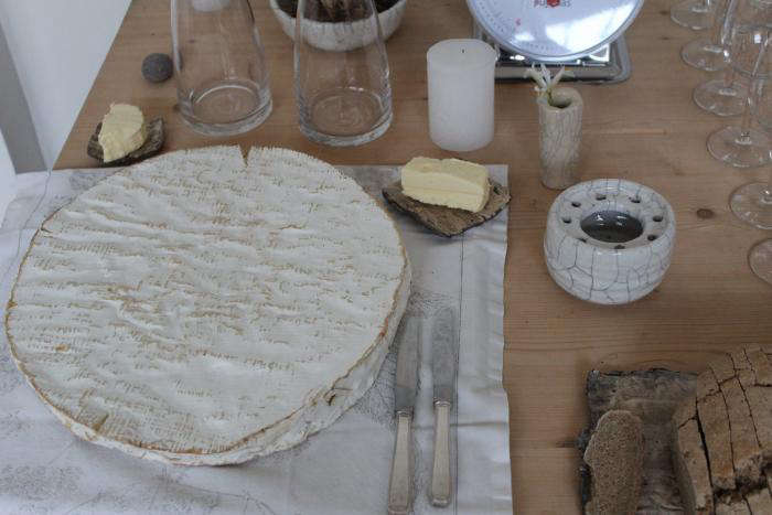 Source a gigantic round of brie-style soft cheese to feed hungry guests.