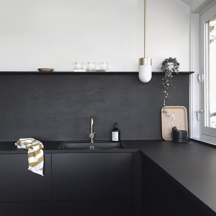 DIY black plywood backsplash by Nina Holst of Stylizimo | Remodelista