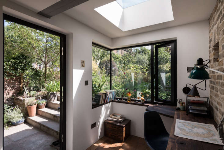A stand-alone studio in the backyard may just be the holy grail of home offices. This one is particularly nice because of its views of and access to the garden. Photograph by French + Tye, courtesy of MW Architects, from A Light-Filled Writing Studio (plus Outdoor Shower) for a London Author.