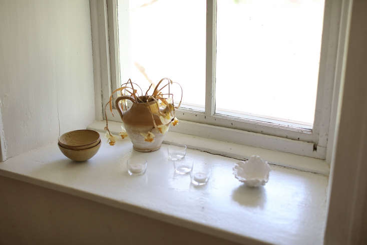 A spring windowsill vignette in the deconstructed Hudson Valley home of designer Deborah Ehrlich, desiccated—but still sculptural—daffodils included. See the full tour over on Remodelista.