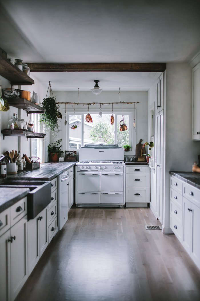 In remodeling her Portland, Oregon, kitchen, blogger Eva Kosmas Flores found a vintage 1950s Roper gas range on Craigslist for $375, and had the kitchen reconfigured with a gas line. Read more at A Food Blogger’s Rustic DIY Renovation in Portland, OR, Dark and Moody Edition.