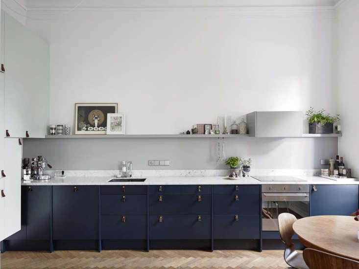 A kitchen in Sweden with a small-scale electric range. See Trend Alert: The Cult of the Blue Kitchen, 10 Favorites; photograph via Swedish real estate site Entrance.