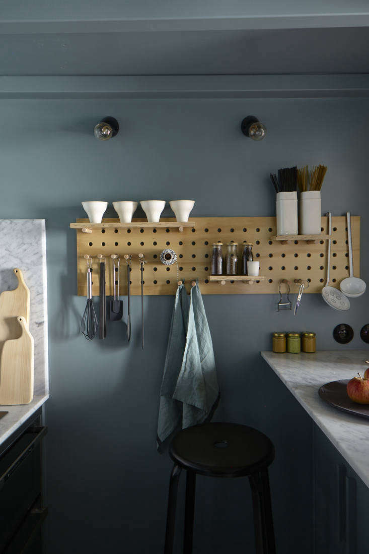 Kitchen Pegboard in Tiny Paris Apartment by Marianne Evennou