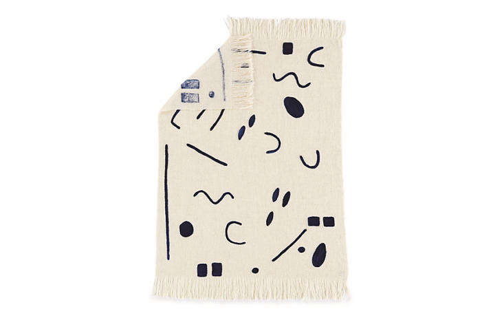 Sara Berks, founder of Minna, an online store that specializes in textiles produced in collaboration with artisans in developing countries, designed this wool Abstract Throw, which was then handwoven by a Uruguayan women’s cooperative; $350 at DWR. (It’s also available in different colors at Food52.)