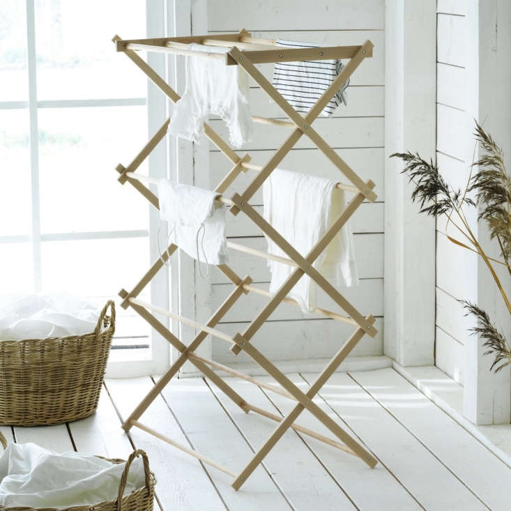 The Borstad line includes laundry solutions like a solid beech Drying Rack ($34.99) and a Basket with Handles ($29.99).