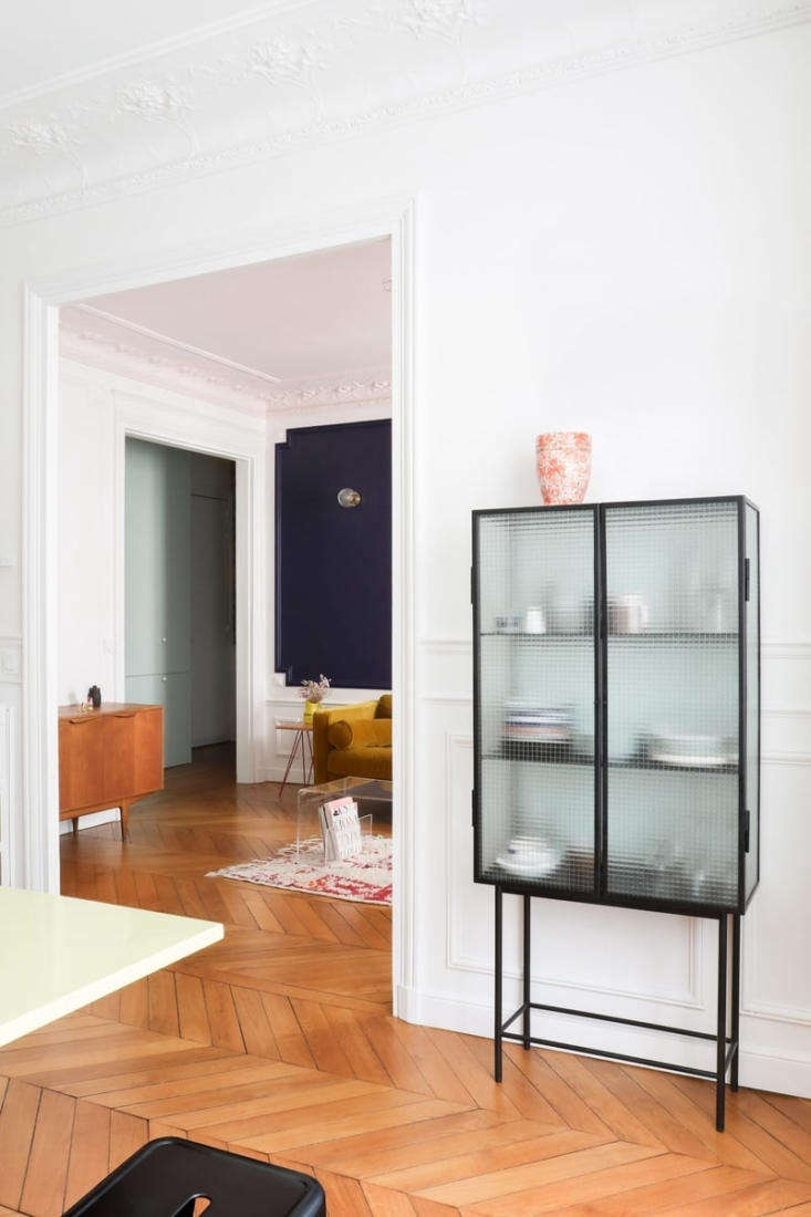 Classic Paris apartment modernized by Heju Studio architecture.