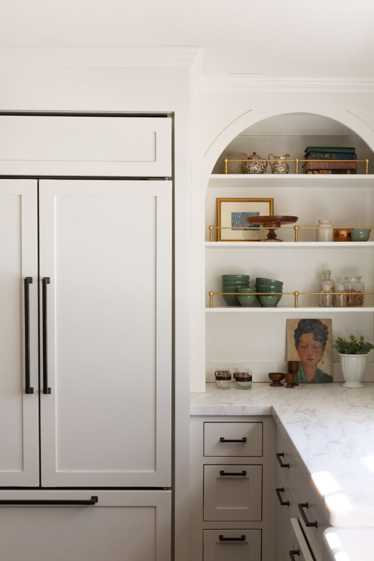 Paneled fridge in modern-traditional kitchen remodel in Great Barrington, MA, by Jess Cooney-Interiors. Lisa Vollmer photo.