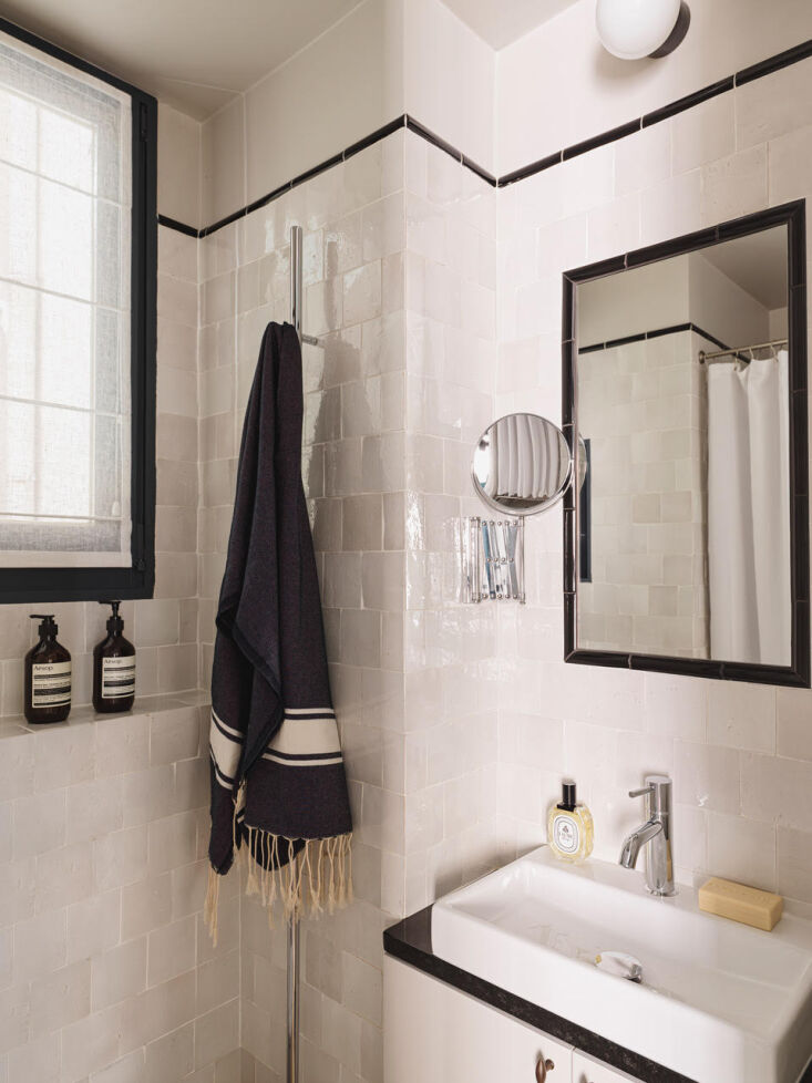 Small tiled bathroom, Marianne Evennou tiny apt remodel, Paris, for Xavier and Chelo. Stephan Julliard photo.