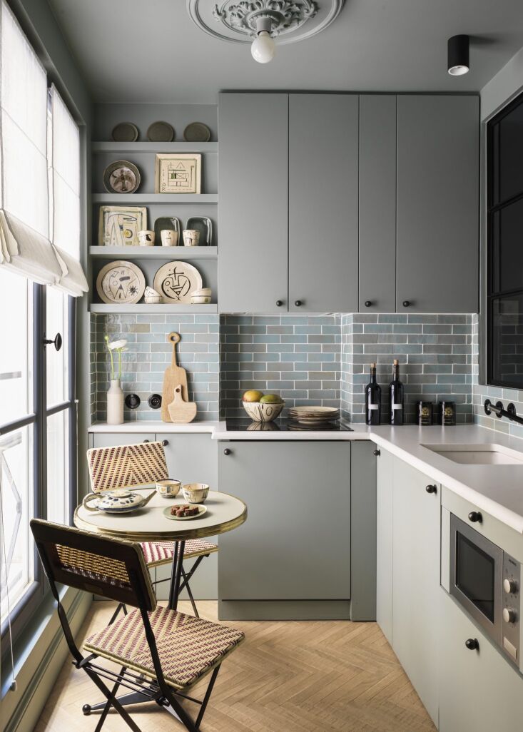 Compact kitchen in small Paris apartment, Marianne Evennou design. Stephan Julliard photo.