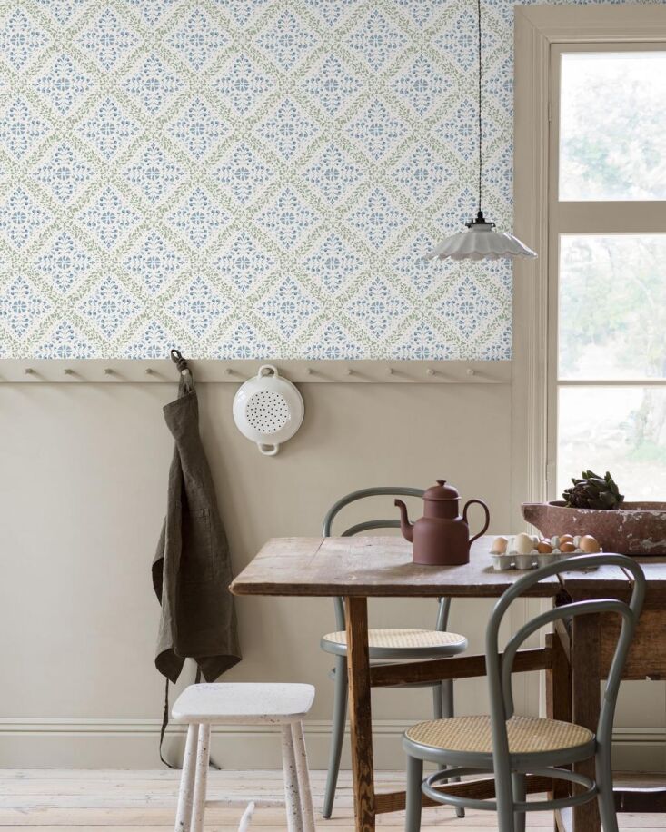 Nyborg was inspired by an antique stencil pattern. It come in three colorways on a pale cream background: green and blue is shown here; scroll to the end to see it in red and blue.