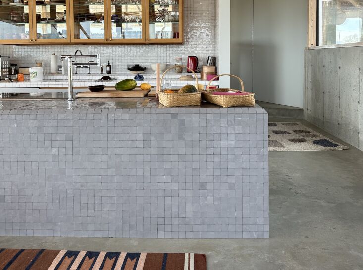 tiled kitchen island in flower house, by no architecture 335