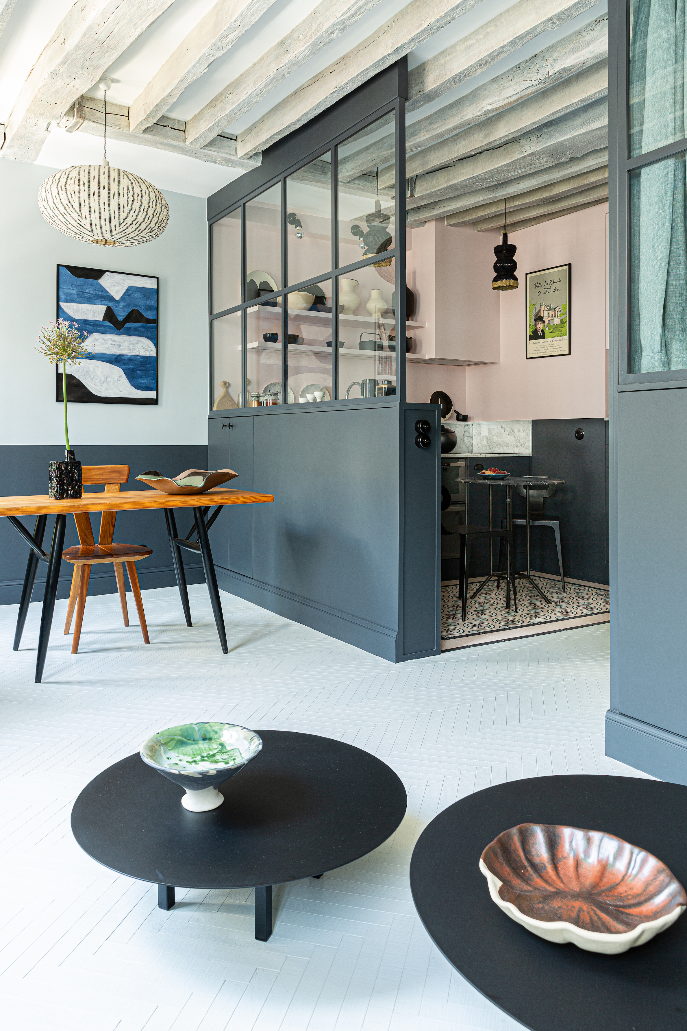 Open dIning area and semi-enclosed kitchen: Sabine's Paris apartment remodel by Marianne Evennou. Grégory Timsit photo.