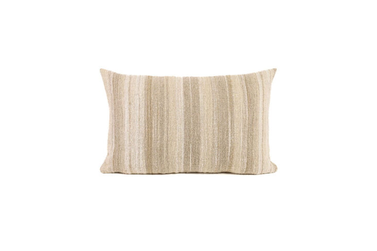 The Uniquity Nagy Pillow \10 in Natural White is \$400 at Clic.