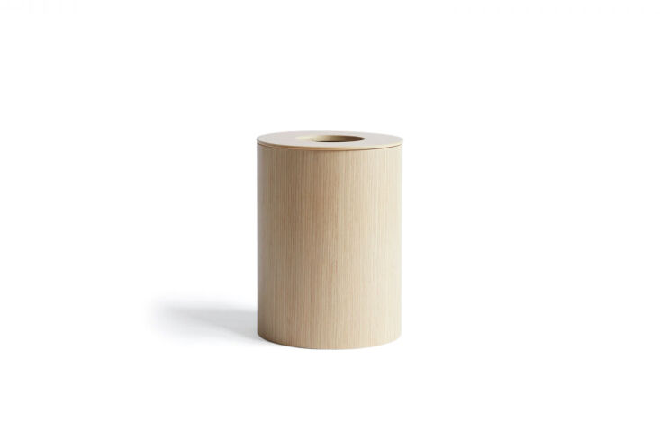 designed by isamu saito, the white oak paper waste basket with cutout lid is \$ 25