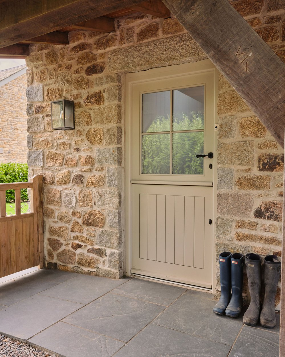 the front porch is cornish granite with a slate walkway and a dutch door— 19