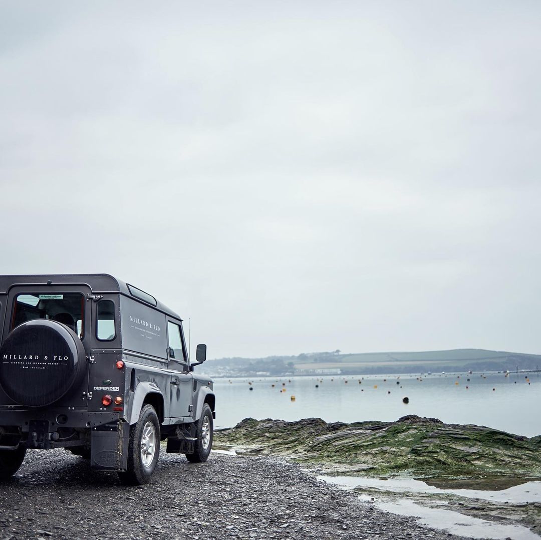 the company car is a land rover defender 90 td5, here overlooking the sea in ro 33