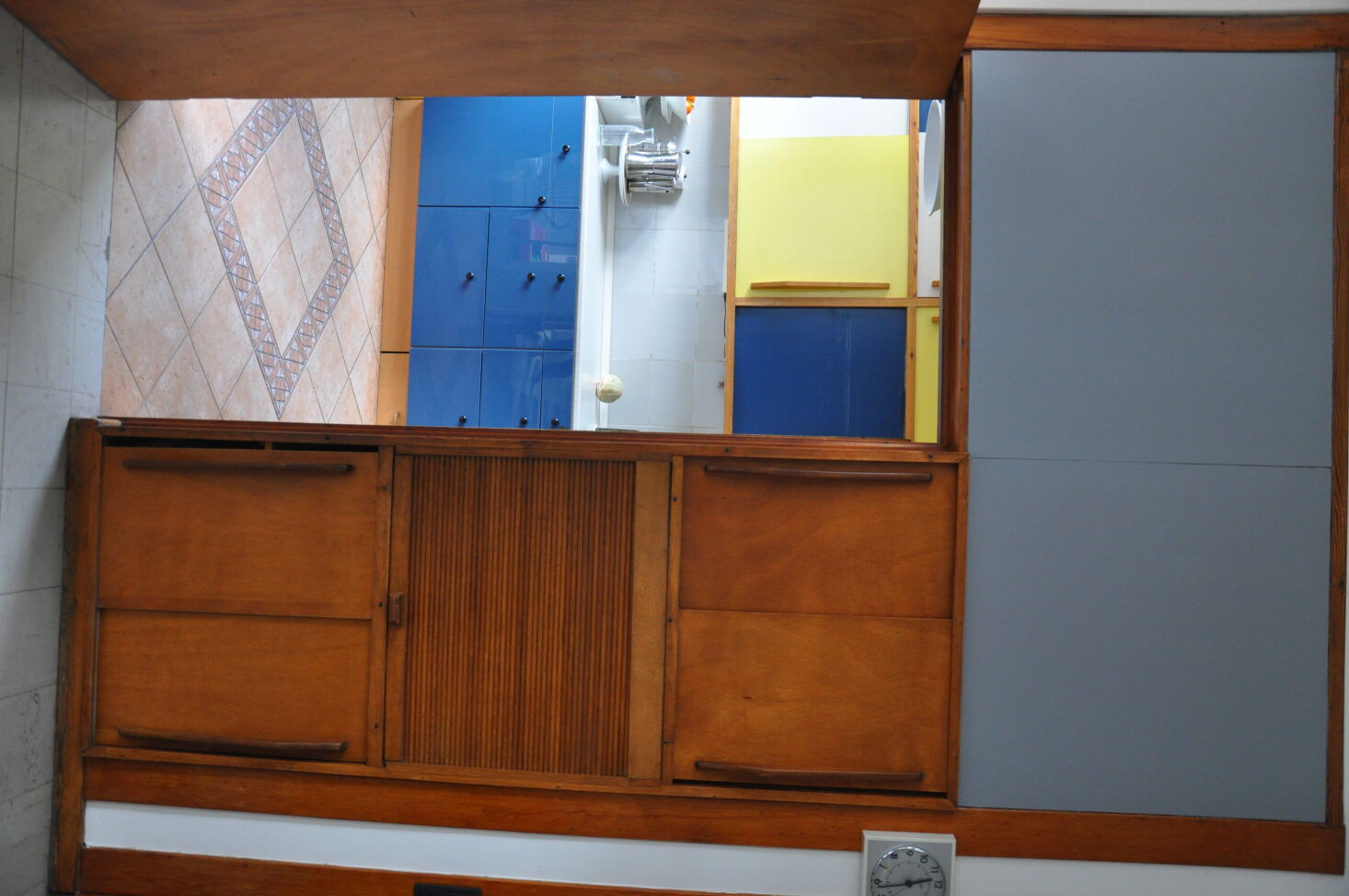 a glimpse at the existing lower cabinets, counter, and floor, all of which were 28