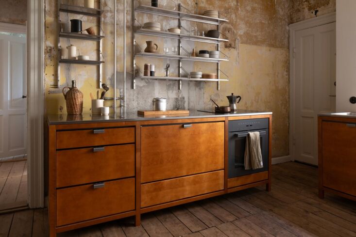 the freestanding wooden components are offered with stainless steel or stone co 18