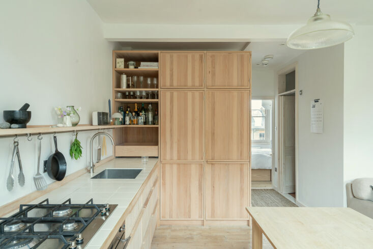 in a small space, a wall of cabinets would have been overwhelming, instead a sl 18