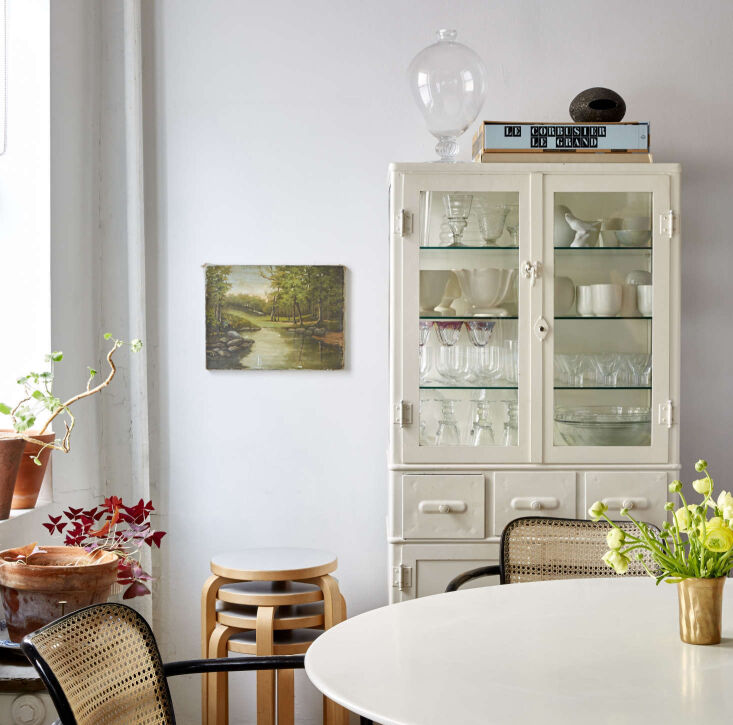 Worth a revisit: Annie recently saved this snapshot from Small-Space Solutions: \17 Affordable Tips from an NYC Creative Couple—the pretty glass cabinet and stacking stools still hold up, \10 years later. Photograph by Kate Sears.