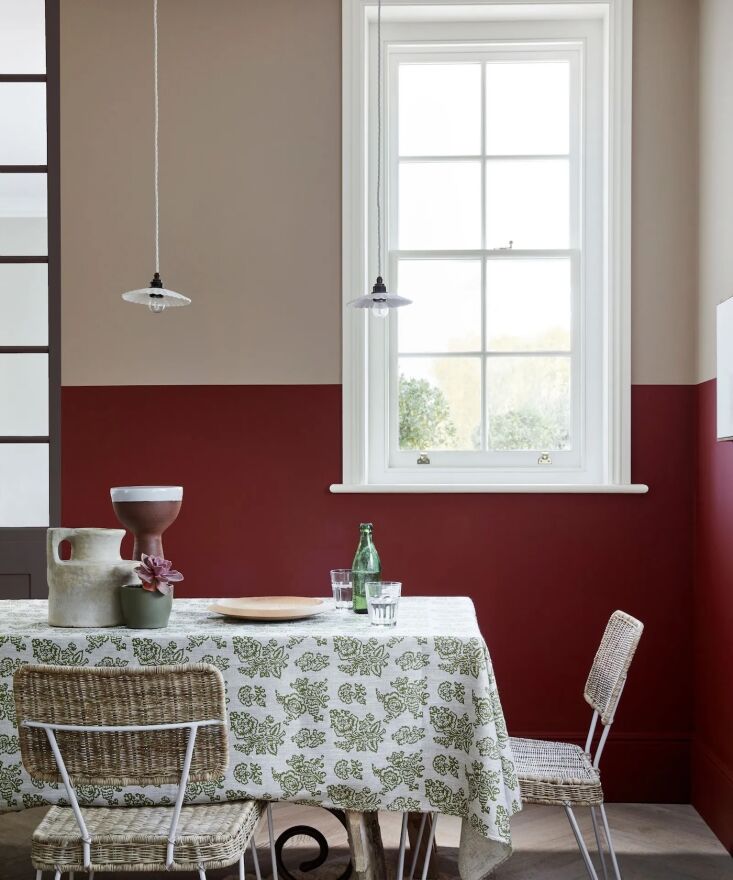 little greene arras warm red paint in an eat in two toned kitchen. 3