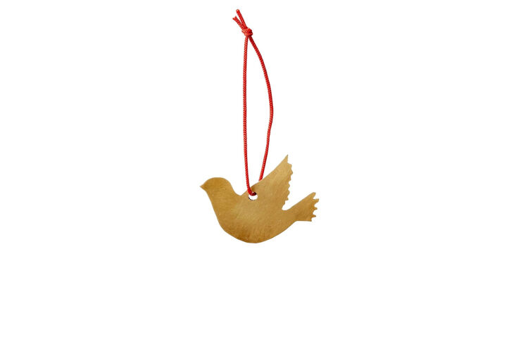 Made from solid brass, Fog Linen&#8\2\17;s simple bird can be hung in a window all year long. Shop now.
