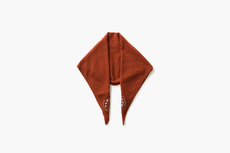 The cashmere neckerchief is having a moment; knotted just so, this embroidered one brings both warmth and style. Shop now.