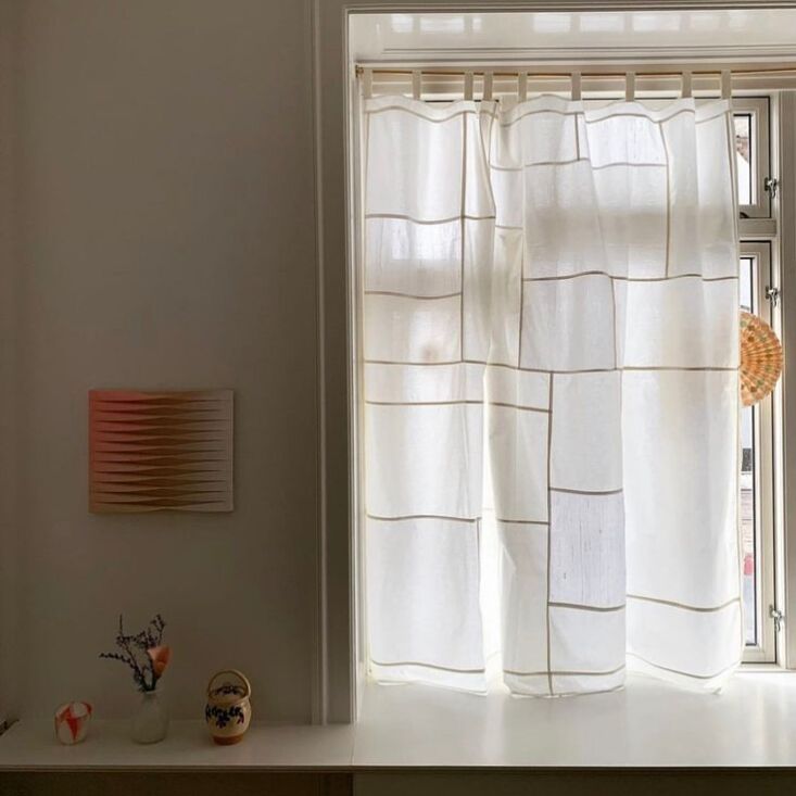 the white aesthetics curtain is \$\13\1.\1\2 from patchwork copenhagen, a mothe 23