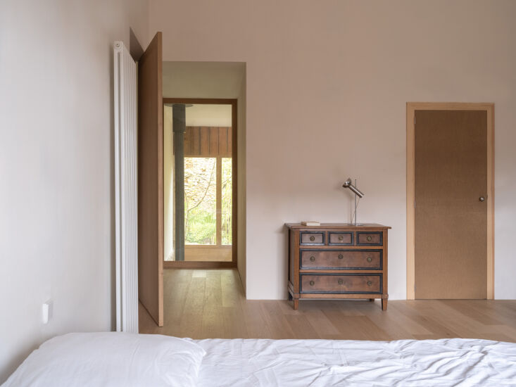 the doors were designed by the architects and made custom by a local carpenter: 31