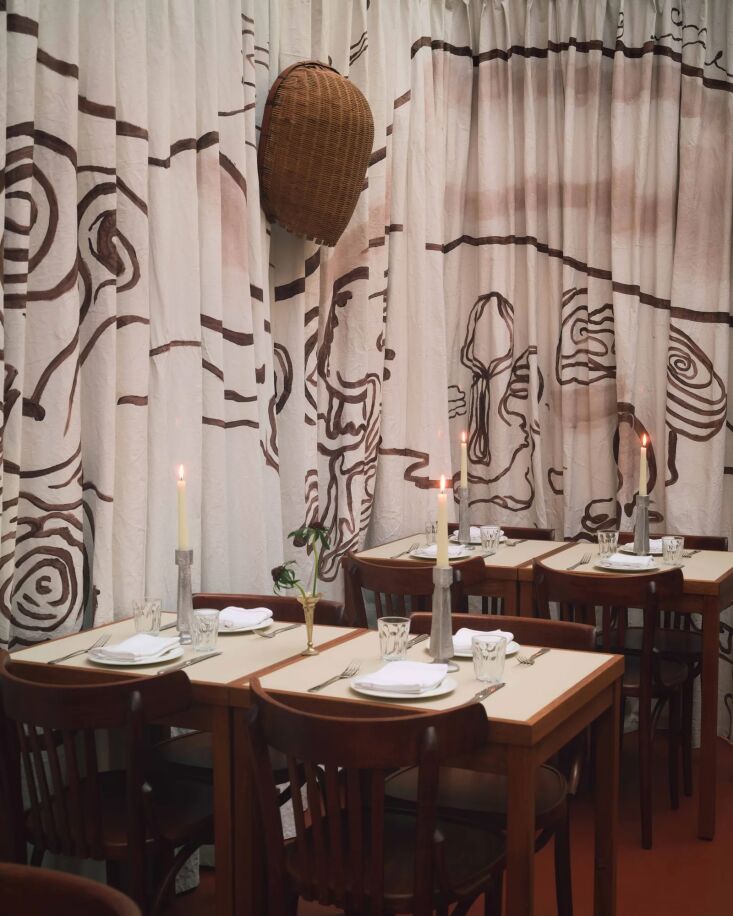 hand painted curtains and a woven basket converted to a wall sconce. 25