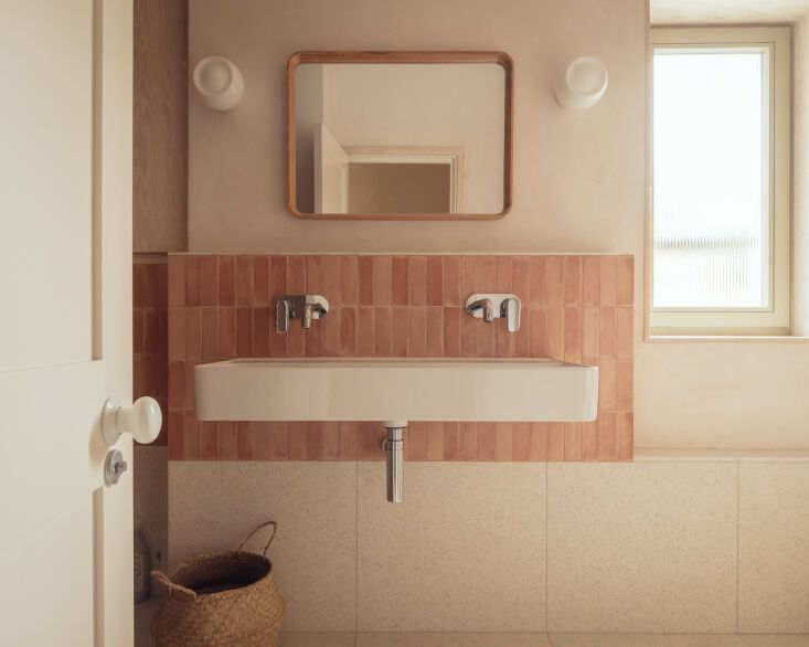 a glimpse of the family bath with tiles from claybrook. 27