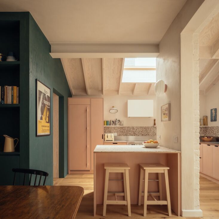green linseed oil stained plywood walls are paired with custom plywood cabinetr 23