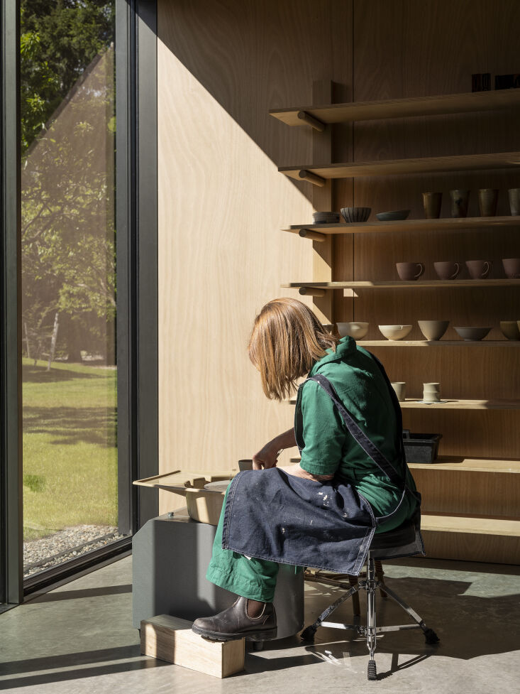 the owner at work in her on site pottery studio. 33